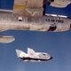 Balls 8 drops the NASA X-38 over the Dryden Flight Research Center in California. Note the mission markings on the fuselage, listing every test flight going back to the X-15 (NASA)